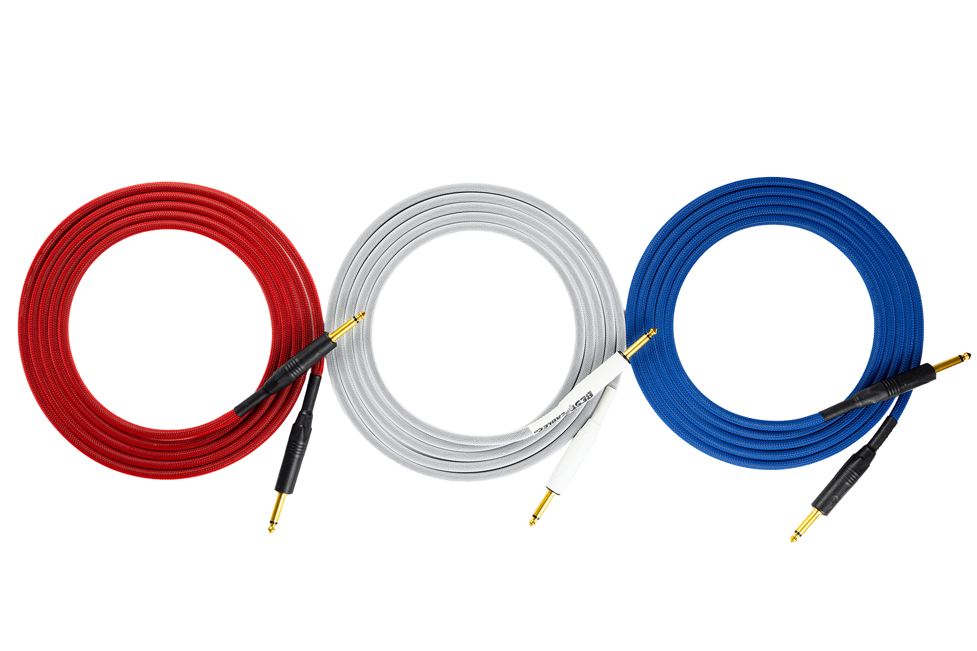 Red, white and blue cables all neatly coiled in a line.