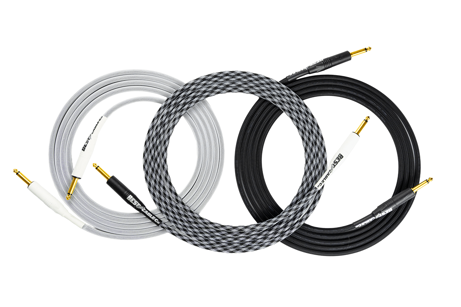 White, black, and checkerboard cables all neatly coiled in a row.