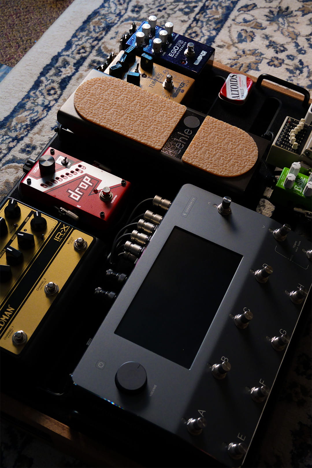 Guitar pedalboard featuring a Neural DSP Quad Cortex and various effects pedals
